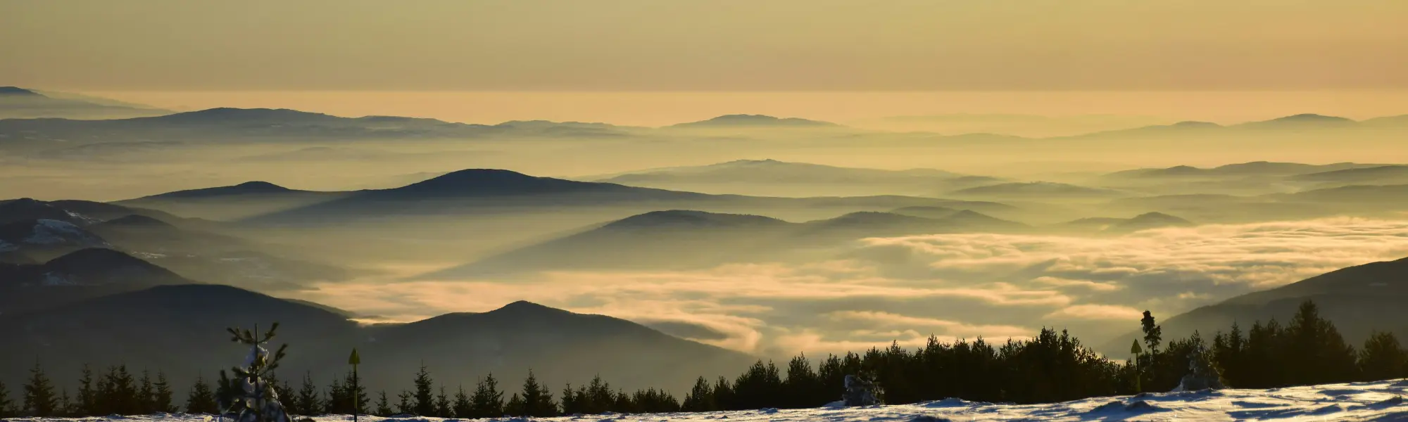 Sunset over a sea of clouds, seen from the snowy slopes of Vitosha mountain